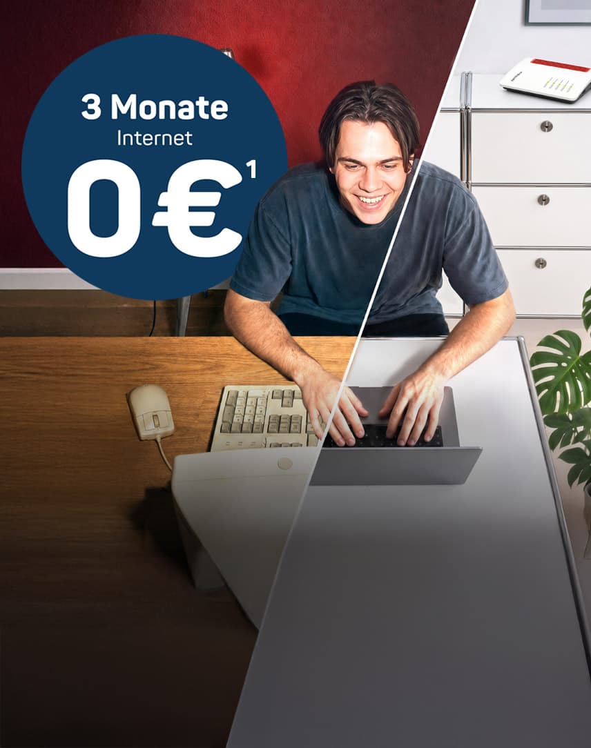 Junger Mann mit einem alten Computer und einem modernen Laptop samt Glasfaser-Router